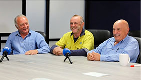 BlueScope employees sitting around a table being interviewed for podcast